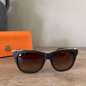 Tory Burch sunglasses with gold detail.  Comes with case.